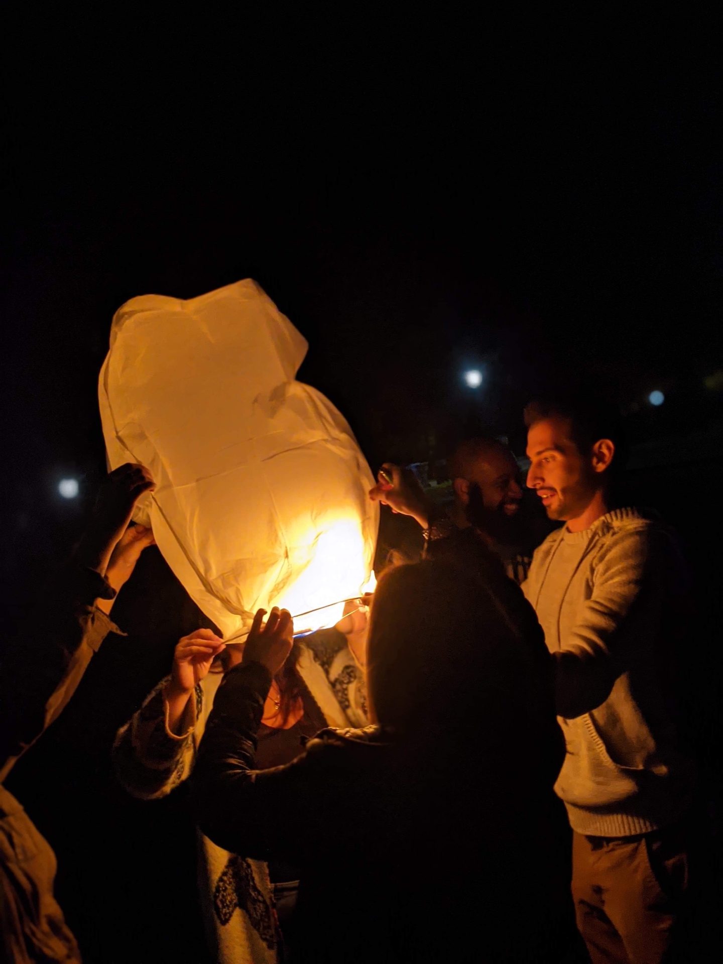 The pack releasing a lantern in Zack's memory